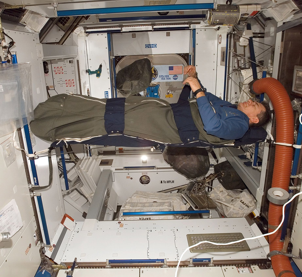 Astronaut Sleeping in Space