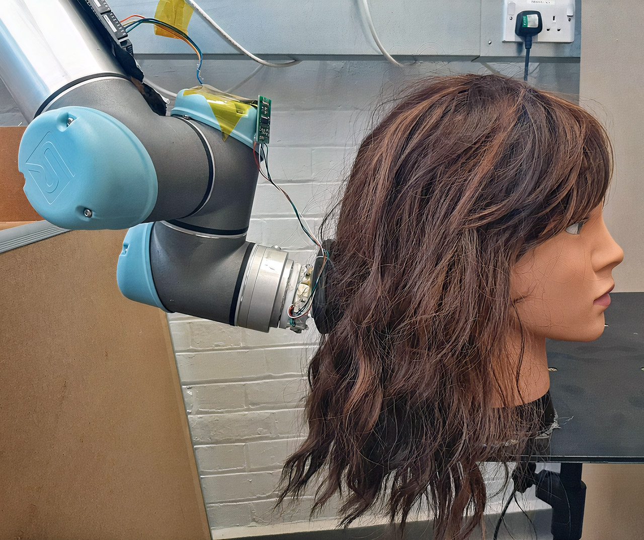 MIT RoboWig Hair Brushing Robot